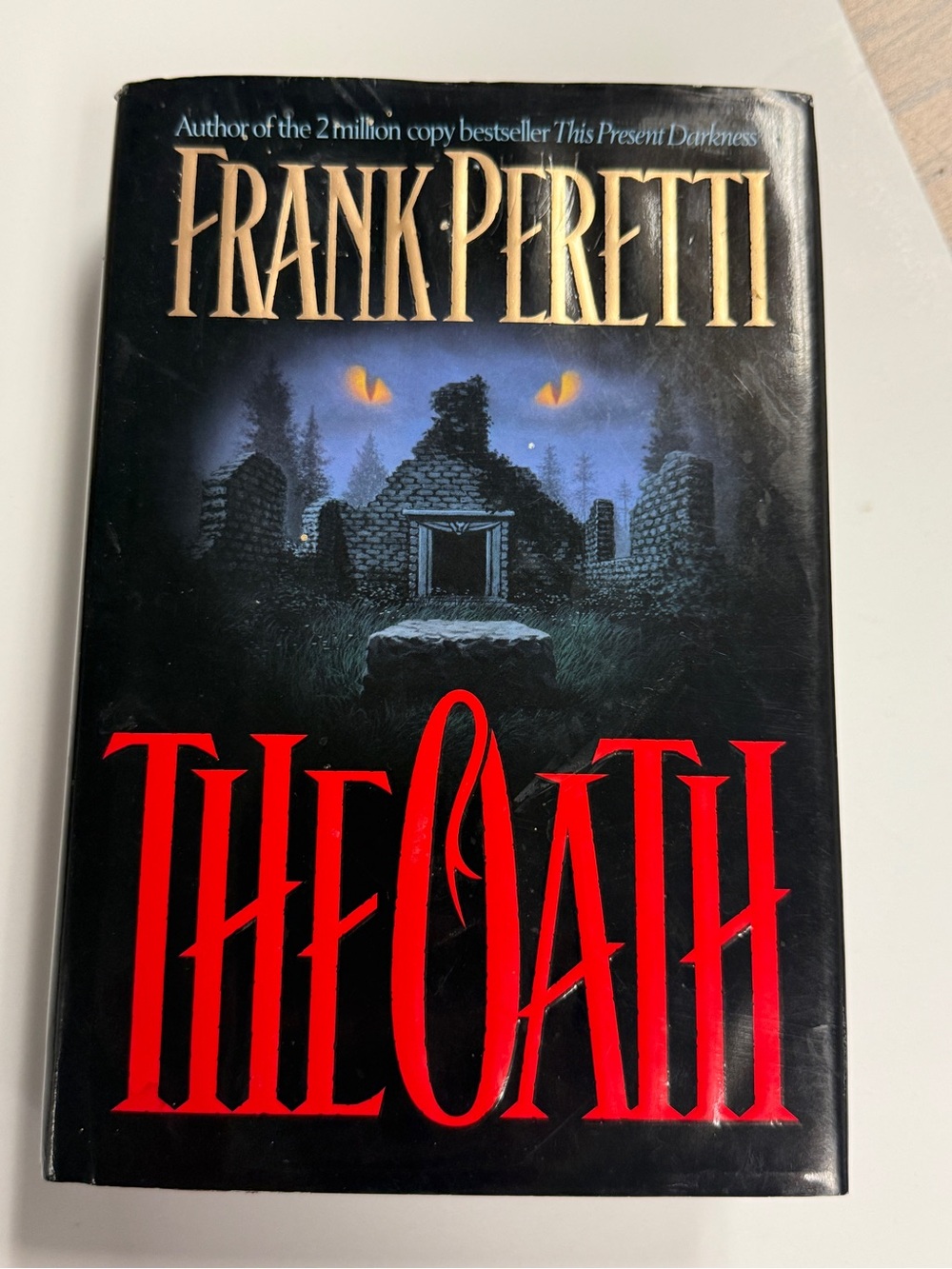 Frank Peretti "The Oath" Hardcover Book - Black & Red Cover